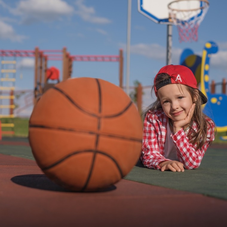 a-cute-little-girl-is-lying-on-rubber-surface-of-p-2024-07-02-19-51-14-utc-760x760.jpg